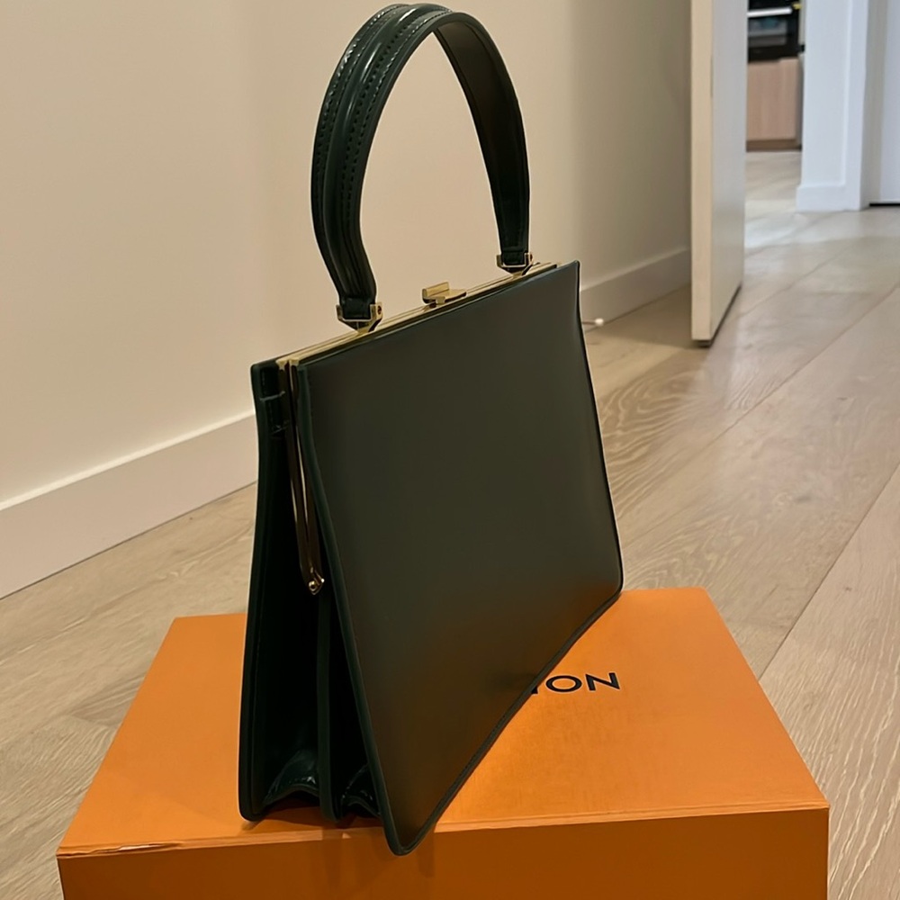 Dark Green Calfskin Medium Clasp Bag
- similar with Celine Clasp Bag